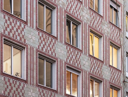 Existing ceramic façade – new windows.