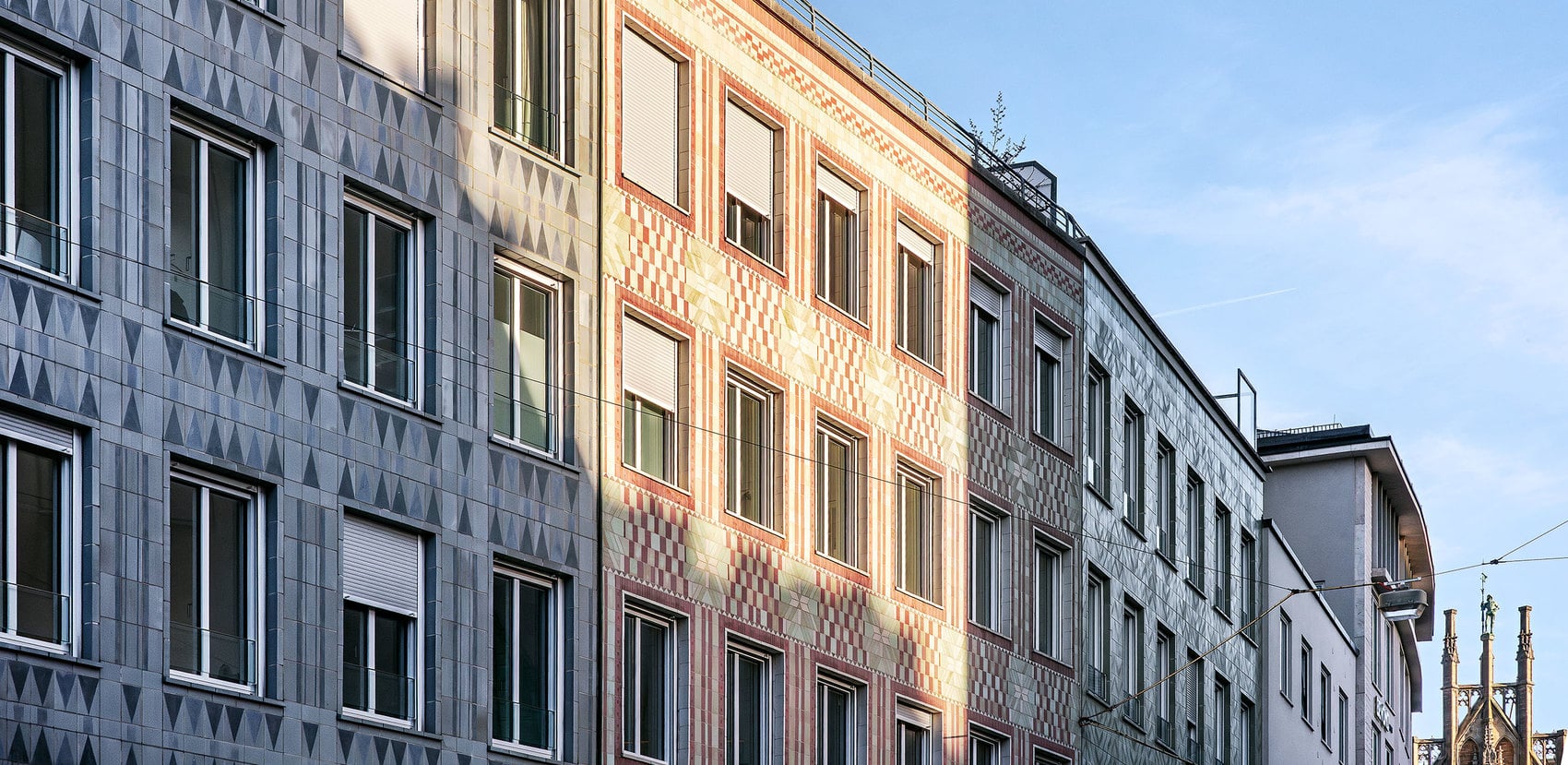 Existing ceramic façade – new windows.